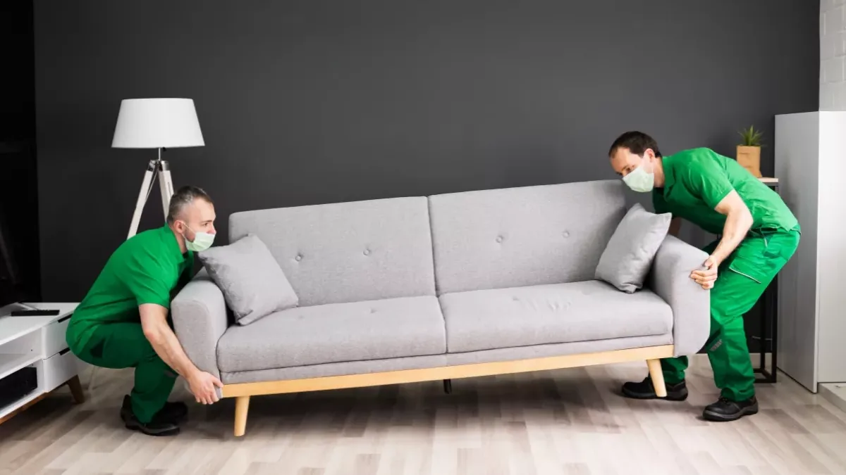 Professional movers carefully packing and transporting furniture in Dubai